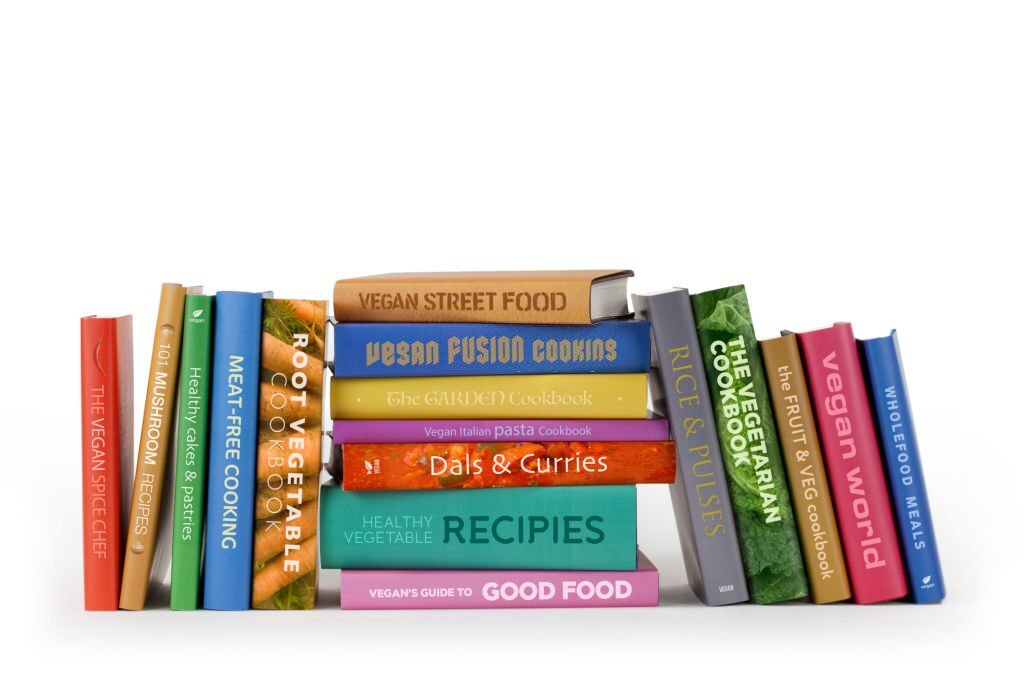 A row of vegan and vegetarian recipe books